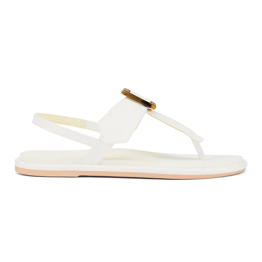 OluKai La'i T-Bar Women's Sandal in White/White — stretchable strap, tubular toe post, tortoise shell buckle, cushioned footbed, back strap design