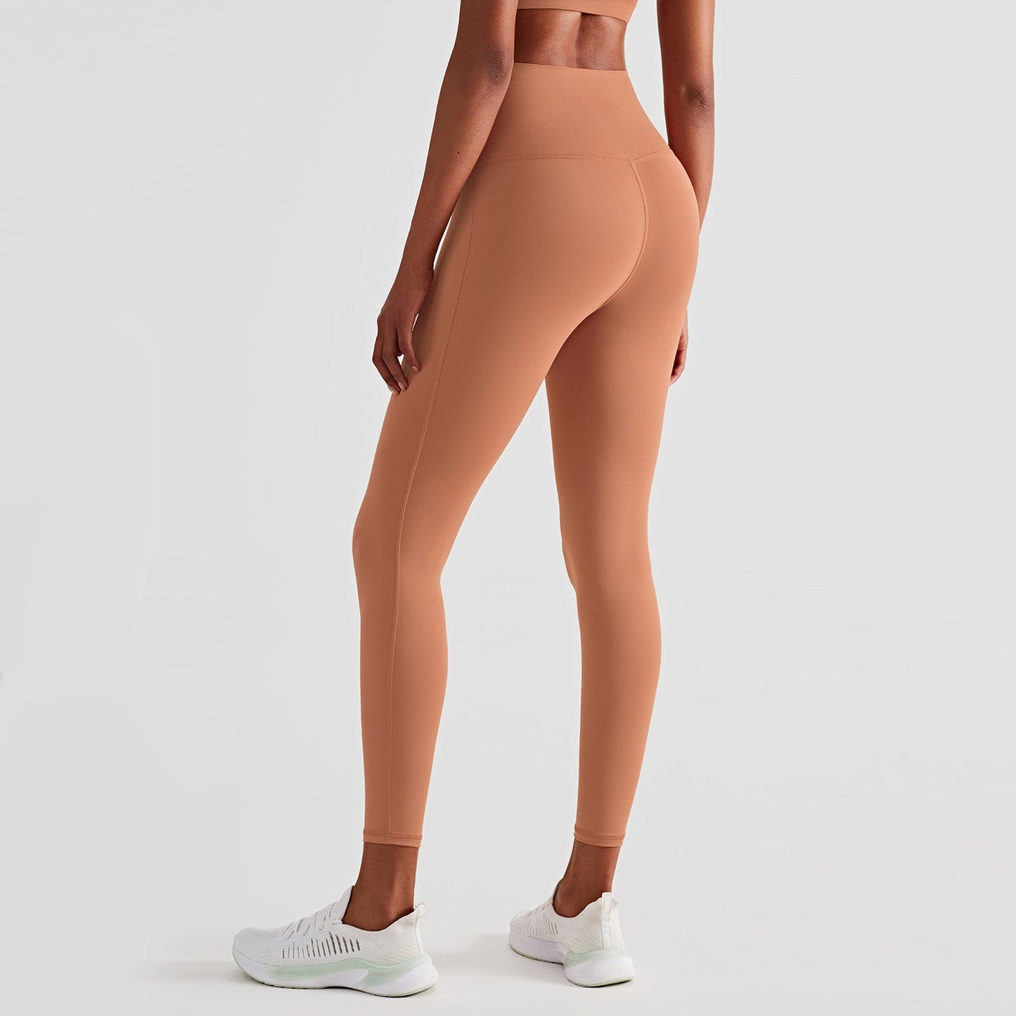 High-waisted Peach Buttocks Fitness Women Wearing Tights With Hips