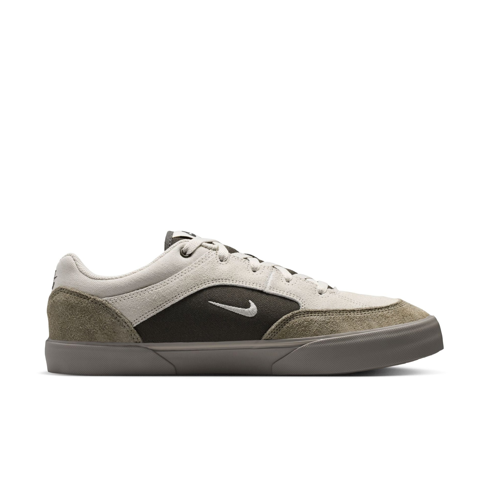 Nike SB Malor Skate Shoes in Light Bone/Light Army— vulcanized skate shoe with suede and canvas upper, extended toe bumper, cushioned collar, and herringbone grip outsole built for entry-level skaters.  