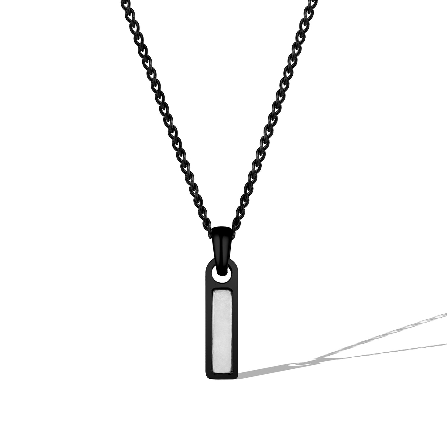 Black chain necklace with a rectangular pendant on a white background