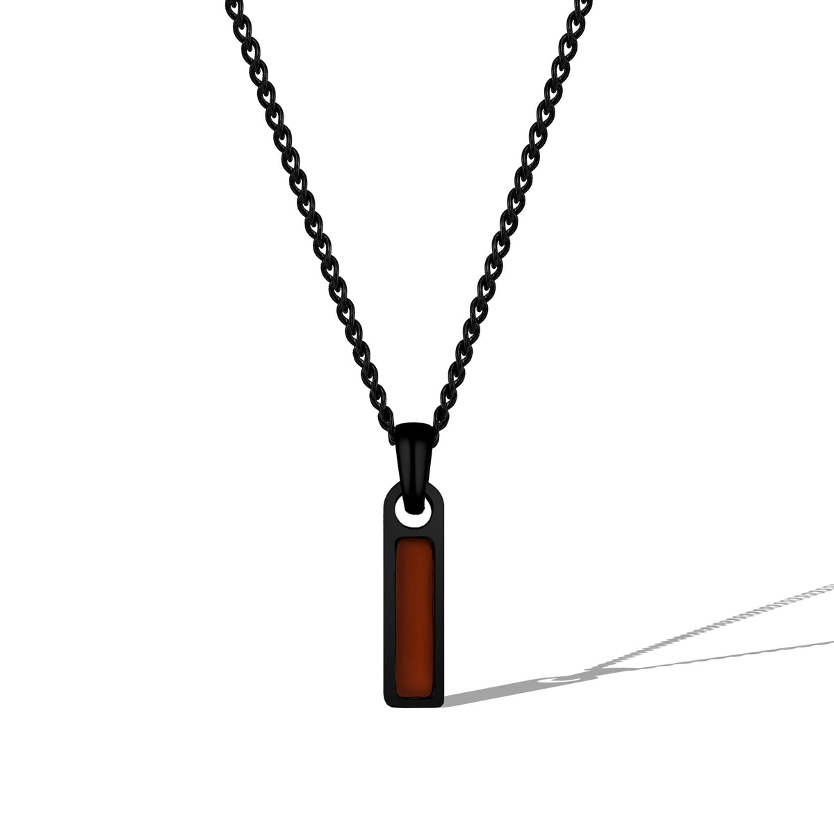 Black chain necklace with a rectangular pendant on a white background