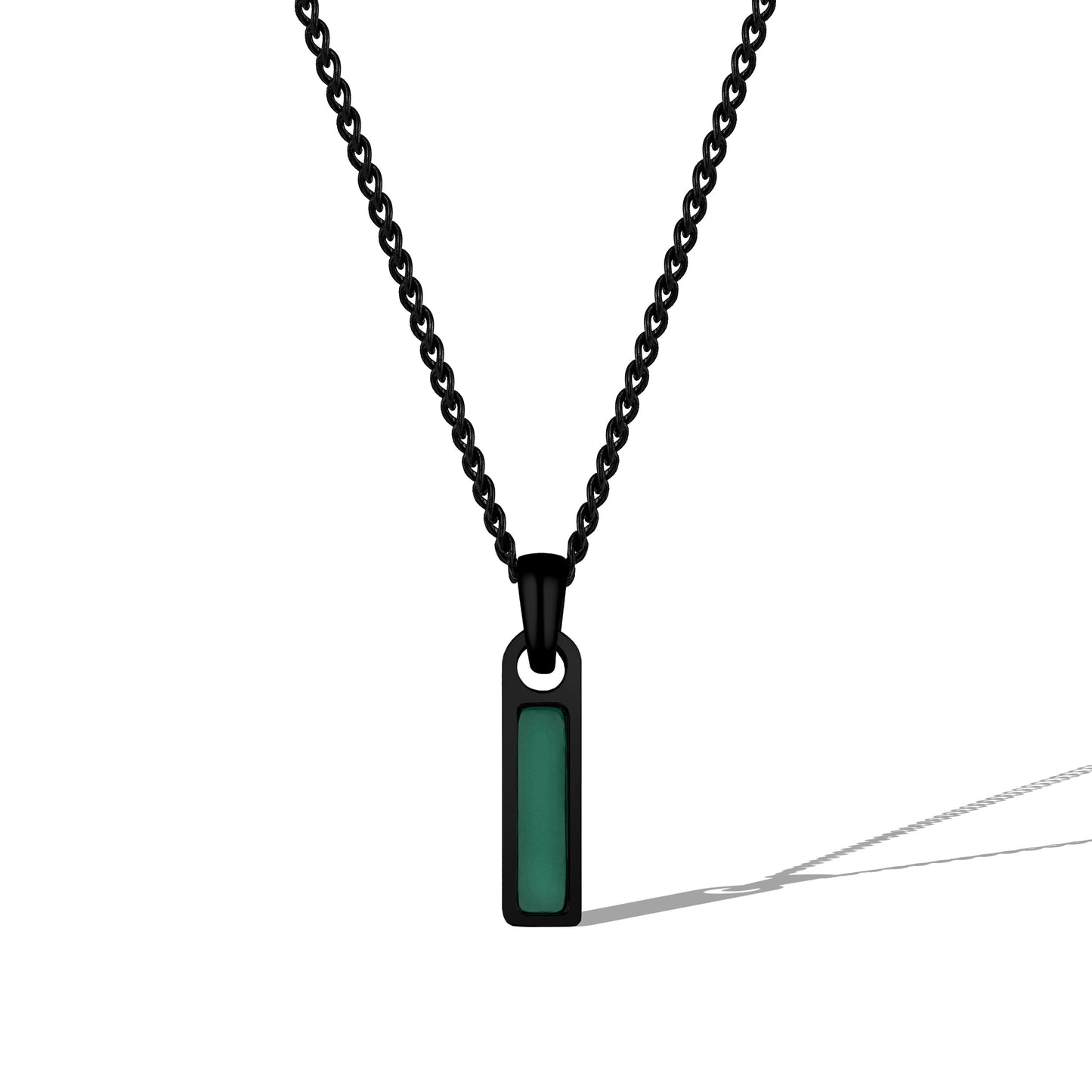 Black chain necklace with a green pendant on a white background