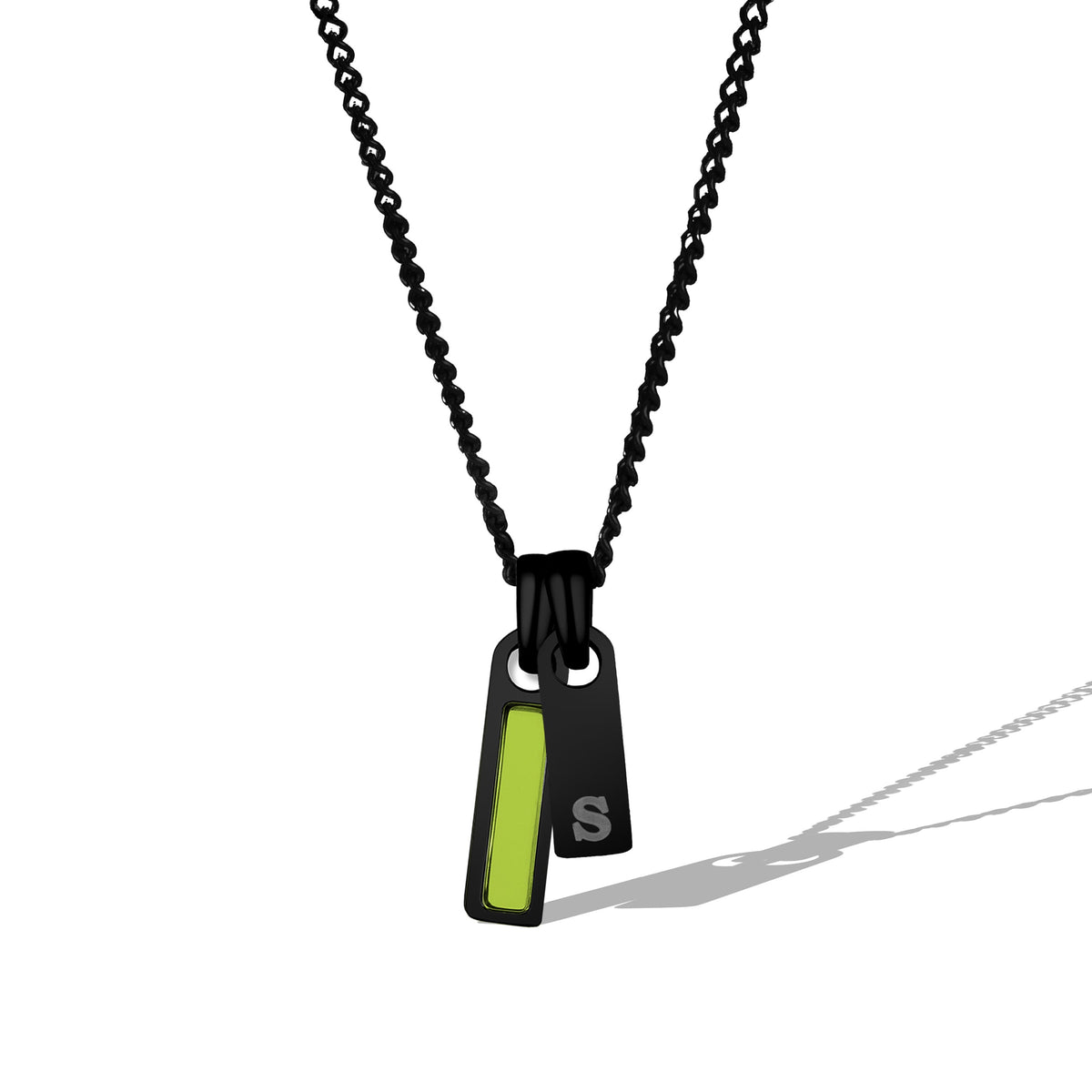 Black necklace with a pendant featuring a green accent on a white background