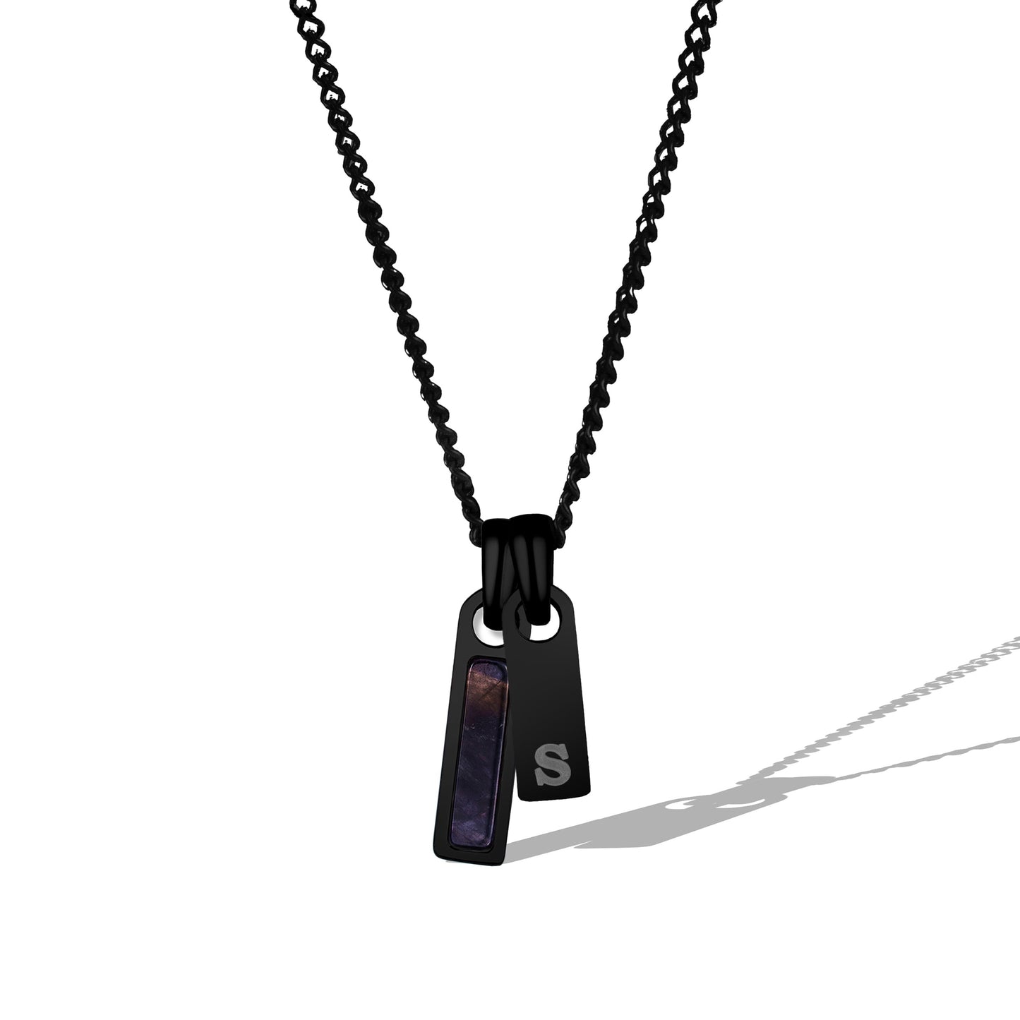 Black necklace with pendant on a white background