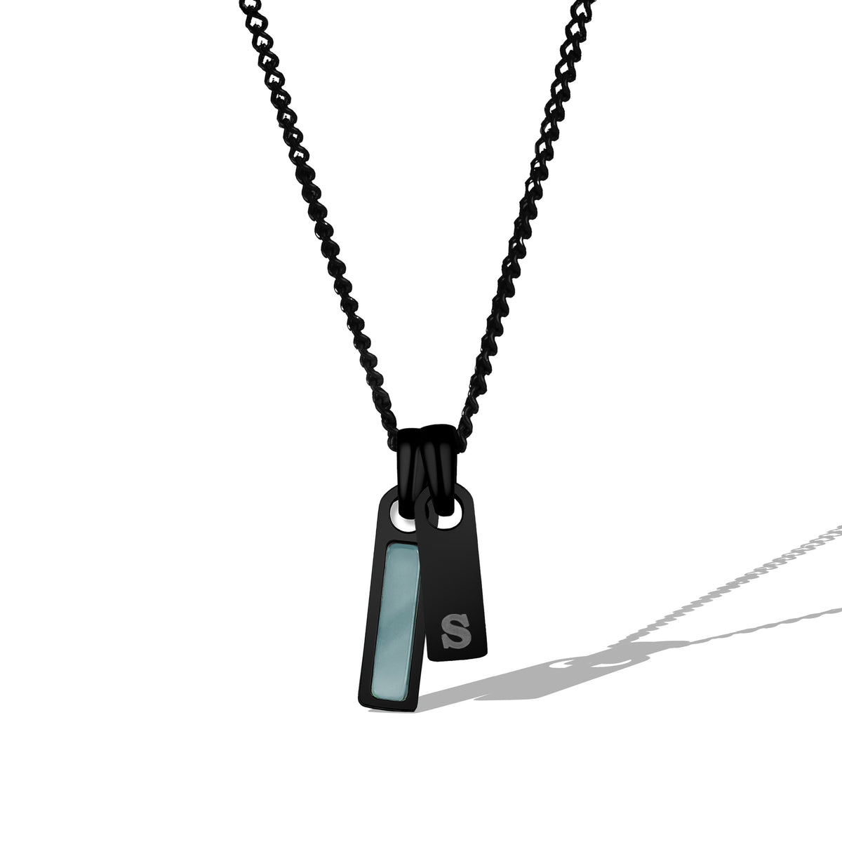Black necklace with a pendant on a white background