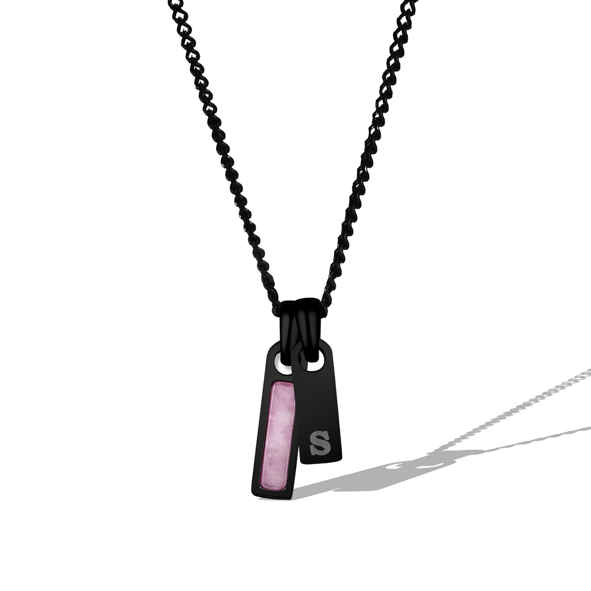 Black chain necklace with a pendant featuring a pink stone and 'S' initials on a white background