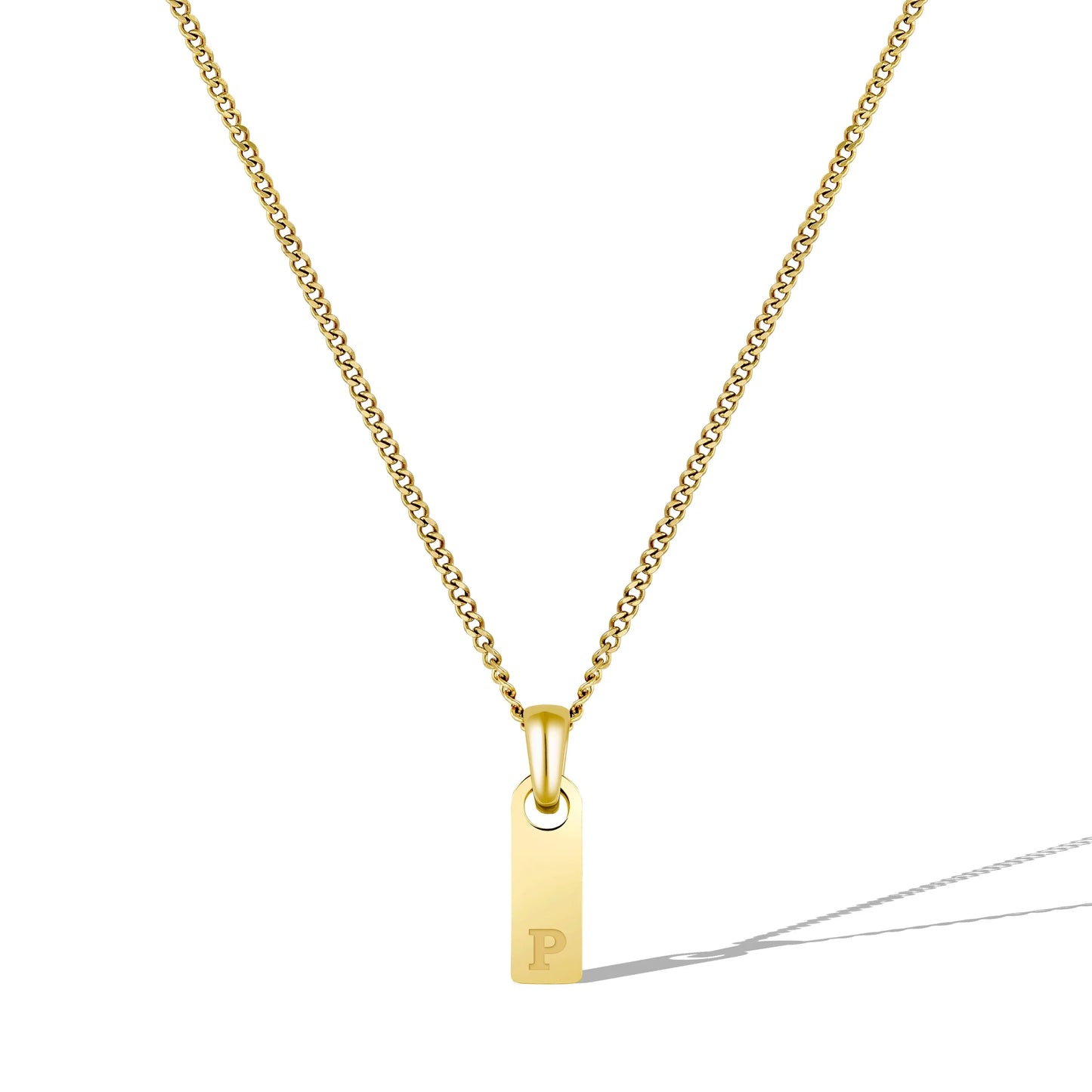 Gold necklace with a small pendant on a white background