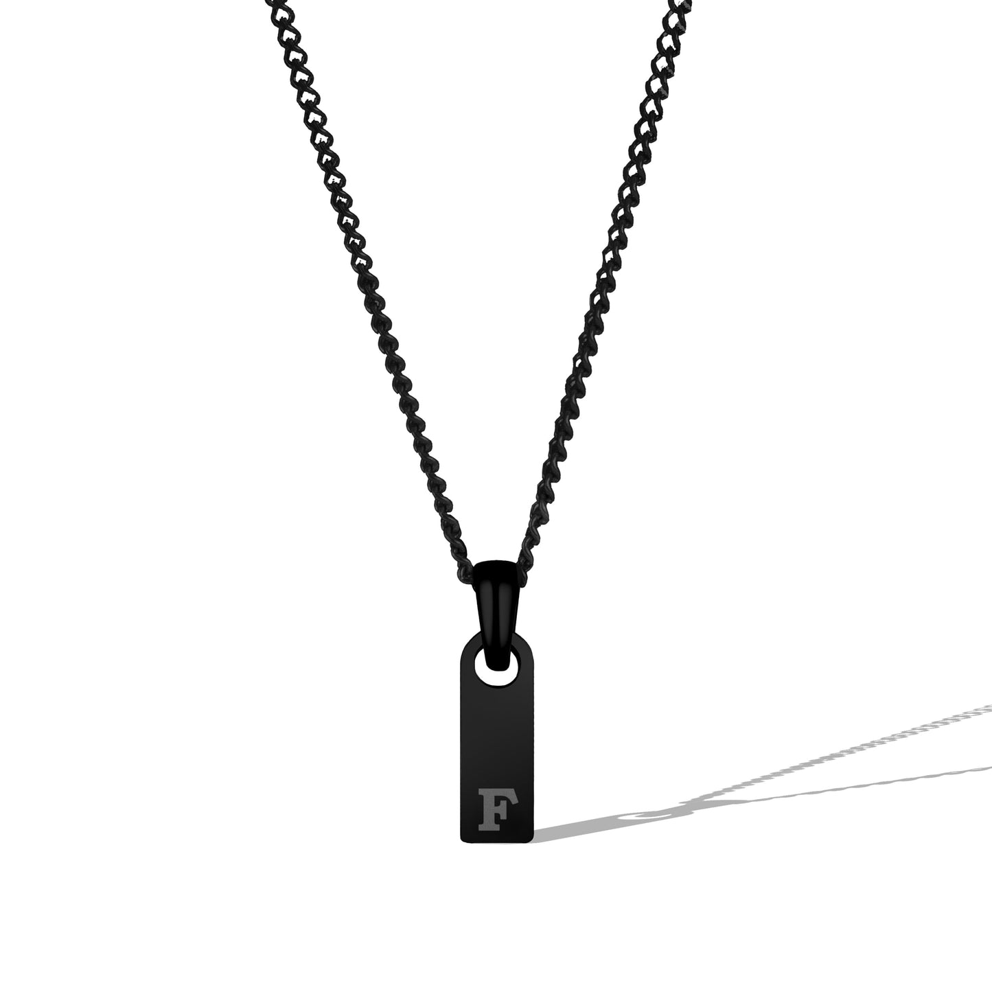 Black necklace with a small pendant on a white background