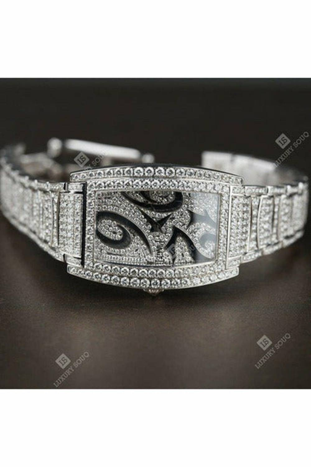 piaget limelight tonneau with diamond bezel white gold on bracelet with silver pave diamond dial ref. goa30057